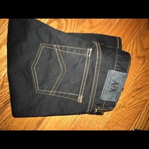 Black A/X jeans with yellow stitching